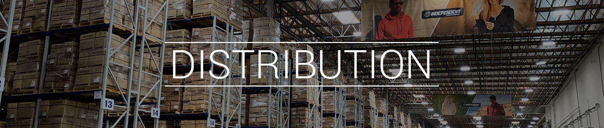 Image of warehouse filled with racks of sweatshirts shipping boxes with the text DISTRIBUTION over it.